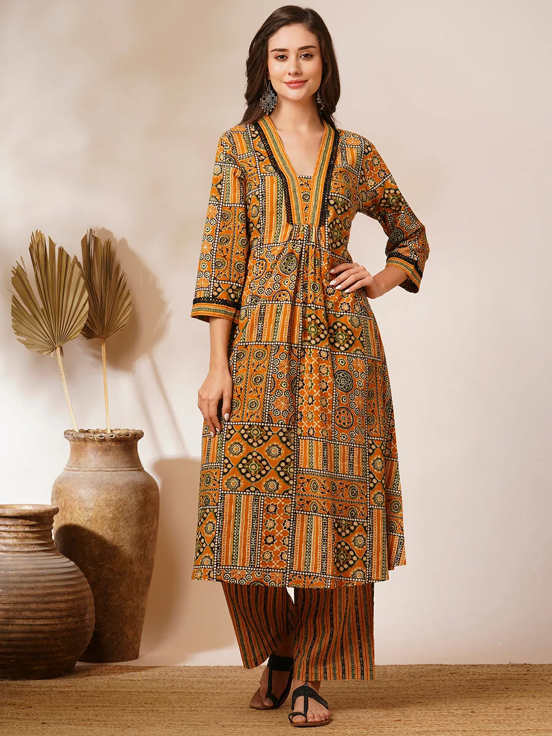 Ethnic Geometric Printed A-Line Pleated Kurta with Palazzo - Mustard