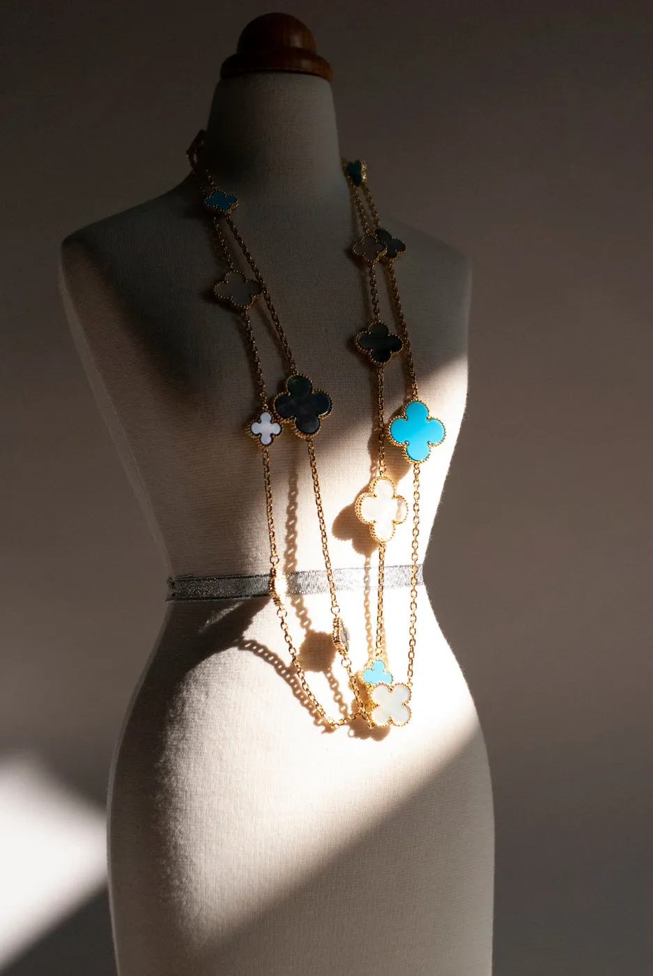 Mixed Size Turquoise and White and Gray Mother of Pearl Quatrefoil Gold Plated Necklace